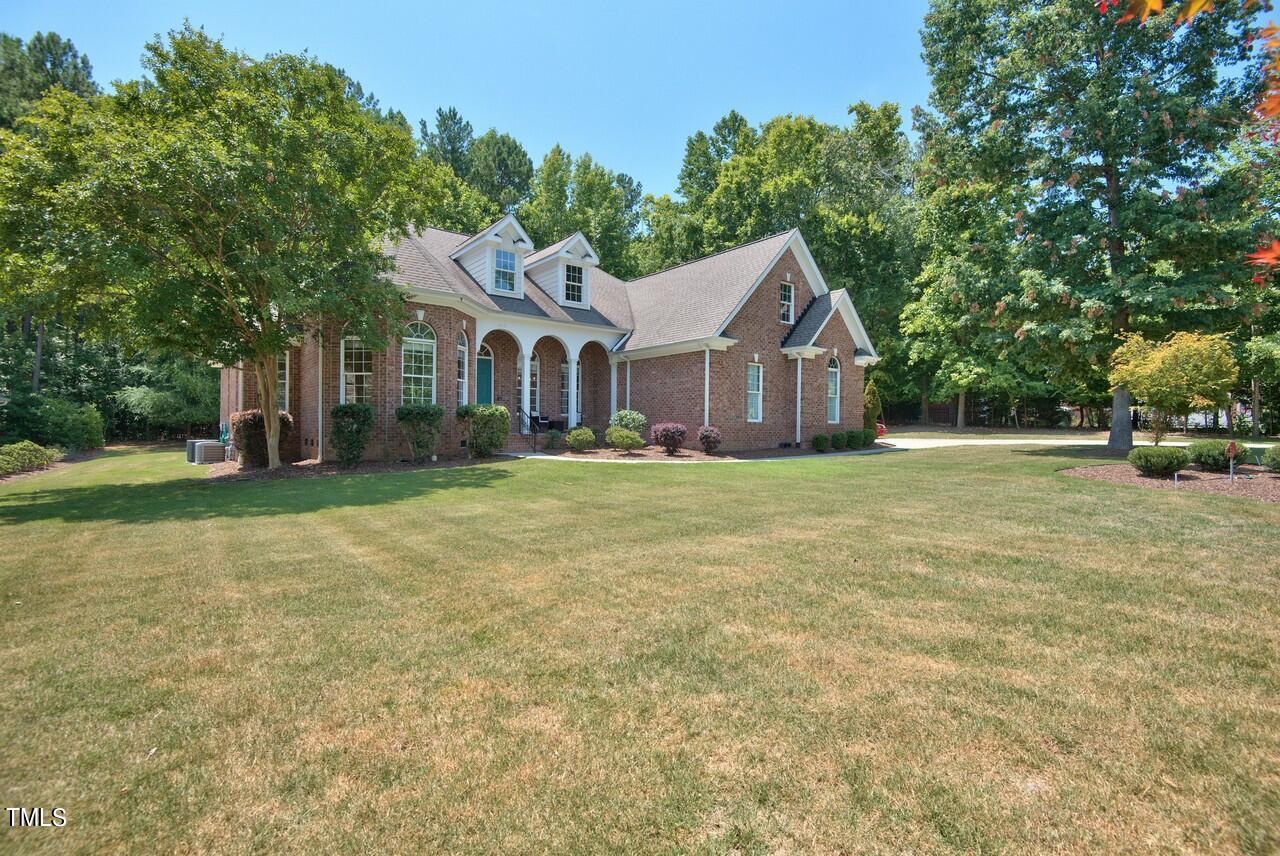 2919 Reynolda Circle Durham, NC 27712 - Photo 1 of 58 a front view of house with yard and green space
