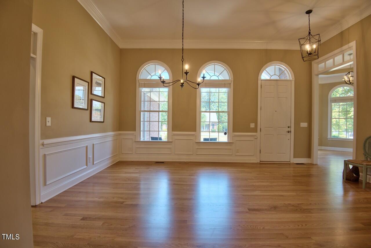2919 Reynolda Circle Durham, NC 27712 - Photo 15 of 58 a view of empty room with wooden floor and fan