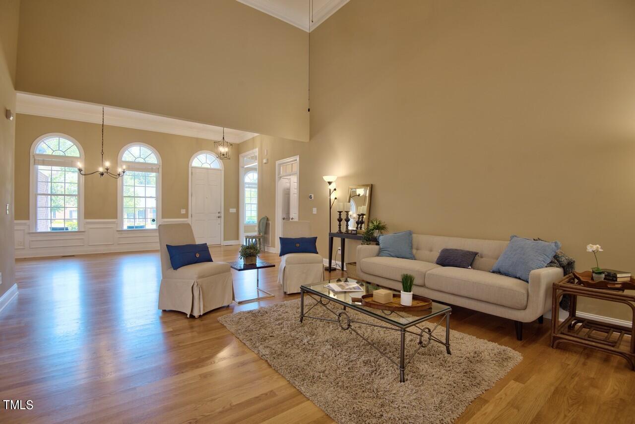 2919 Reynolda Circle Durham, NC 27712 - Photo 23 of 58 a living room with furniture wooden floor and a large window
