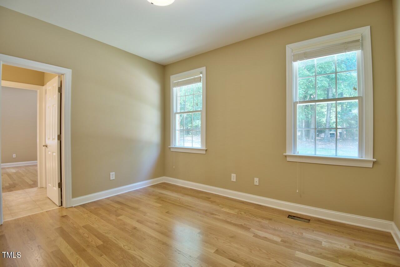 2919 Reynolda Circle Durham, NC 27712 - Photo 35 of 58 an empty room with a empty space and windows