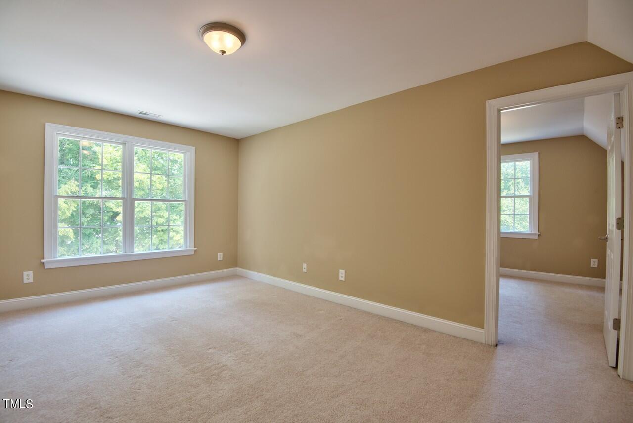 2919 Reynolda Circle Durham, NC 27712 - Photo 54 of 58 an empty room with windows and closet