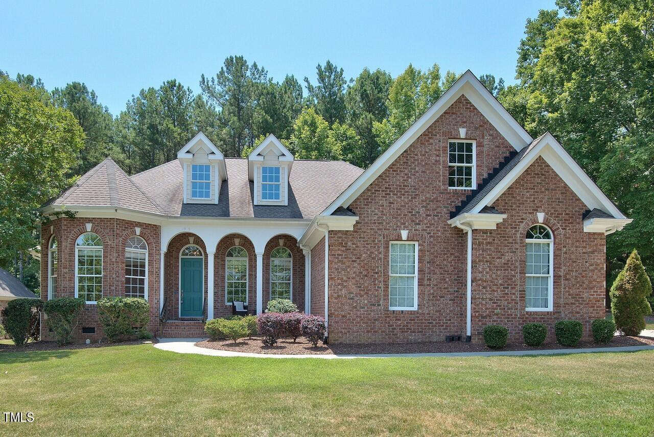 2919 Reynolda Circle Durham, NC 27712 - Photo 57 of 58 a front view of a house with a yard