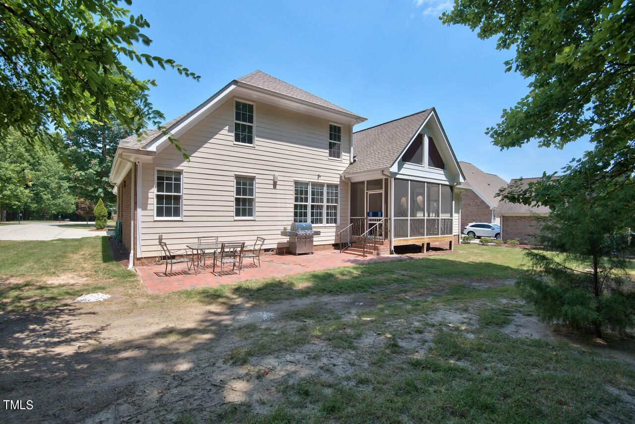 2919 Reynolda Circle Durham, NC 27712 - Photo 8 of 58 a front view of a house with a yard