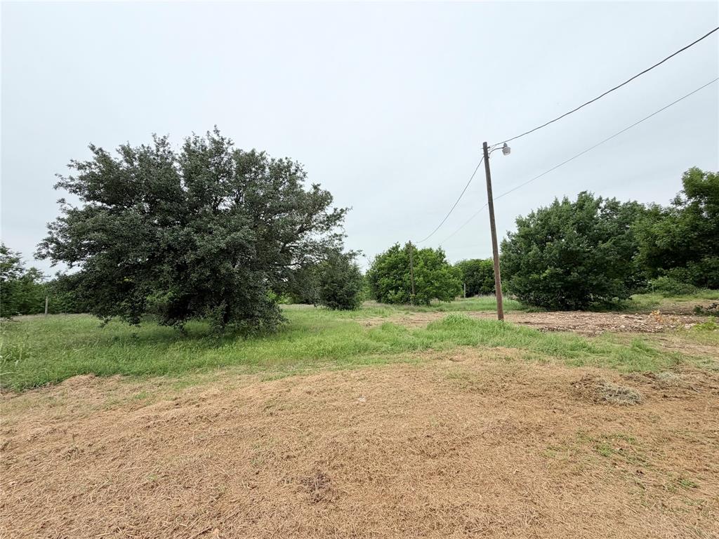 9721 Limestone Joshua, TX 76058 - Photo 33 of 36 a view of a backyard with large trees