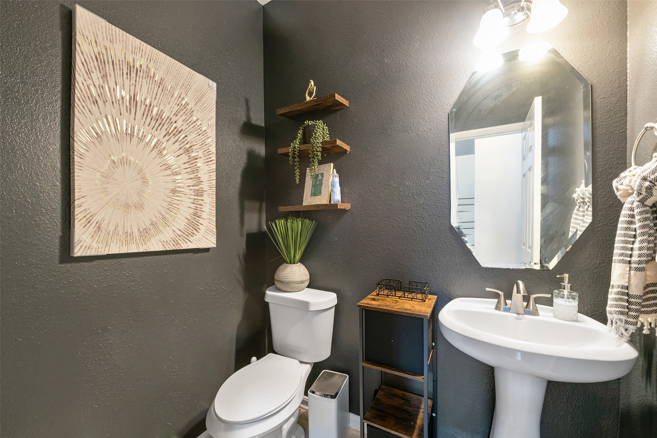 3554 Bennett Trails Drive Spring, TX 77386 - Photo 7 of 44 a bathroom with a toilet a sink and mirror
