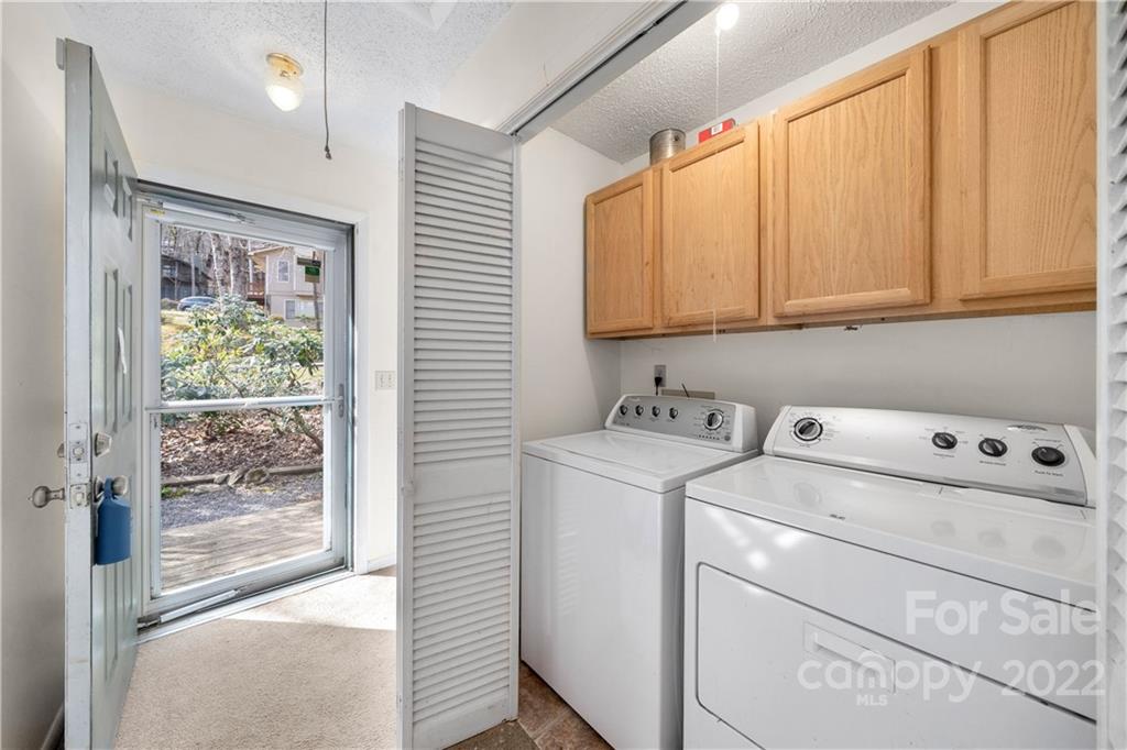 4 Blue Jay Loop Maggie Valley, NC 28751 - Photo 25 of 46 a view of storage and utility room with washer and dryer
