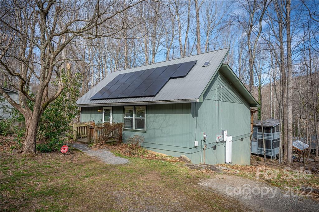 4 Blue Jay Loop Maggie Valley, NC 28751 - Photo 41 of 46 a front view of a house with garden