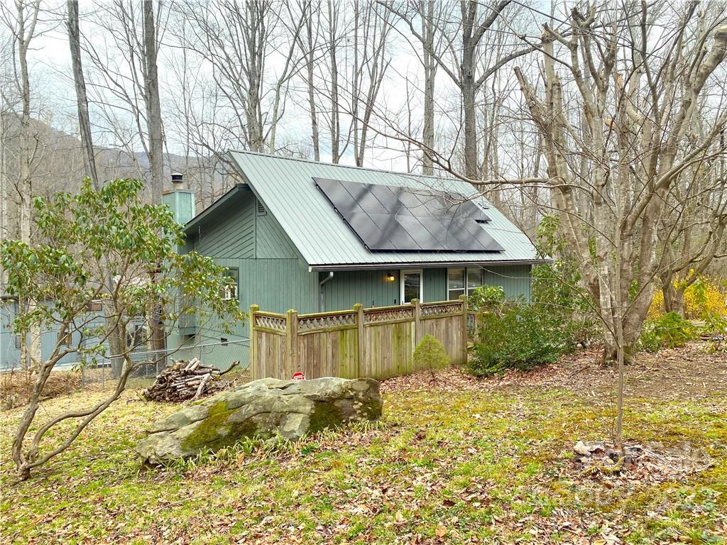 4 Blue Jay Loop Maggie Valley, NC 28751 - Photo 6 of 46 a view of a house with a yard and sitting area