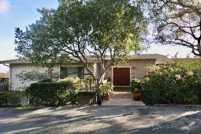 Undisclosed Address Millbrae, CA 94030 - Photo 1 of 30 a front view of a house with garden