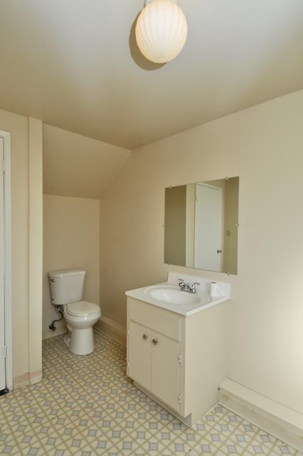Undisclosed Address Millbrae, CA 94030 - Photo 18 of 30 a bathroom with a sink a toilet and a mirror