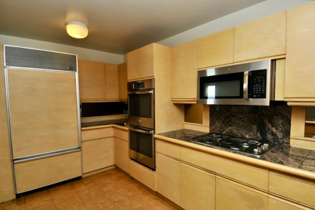 Undisclosed Address Millbrae, CA 94030 - Photo 20 of 30 a kitchen with a refrigerator stove and microwave
