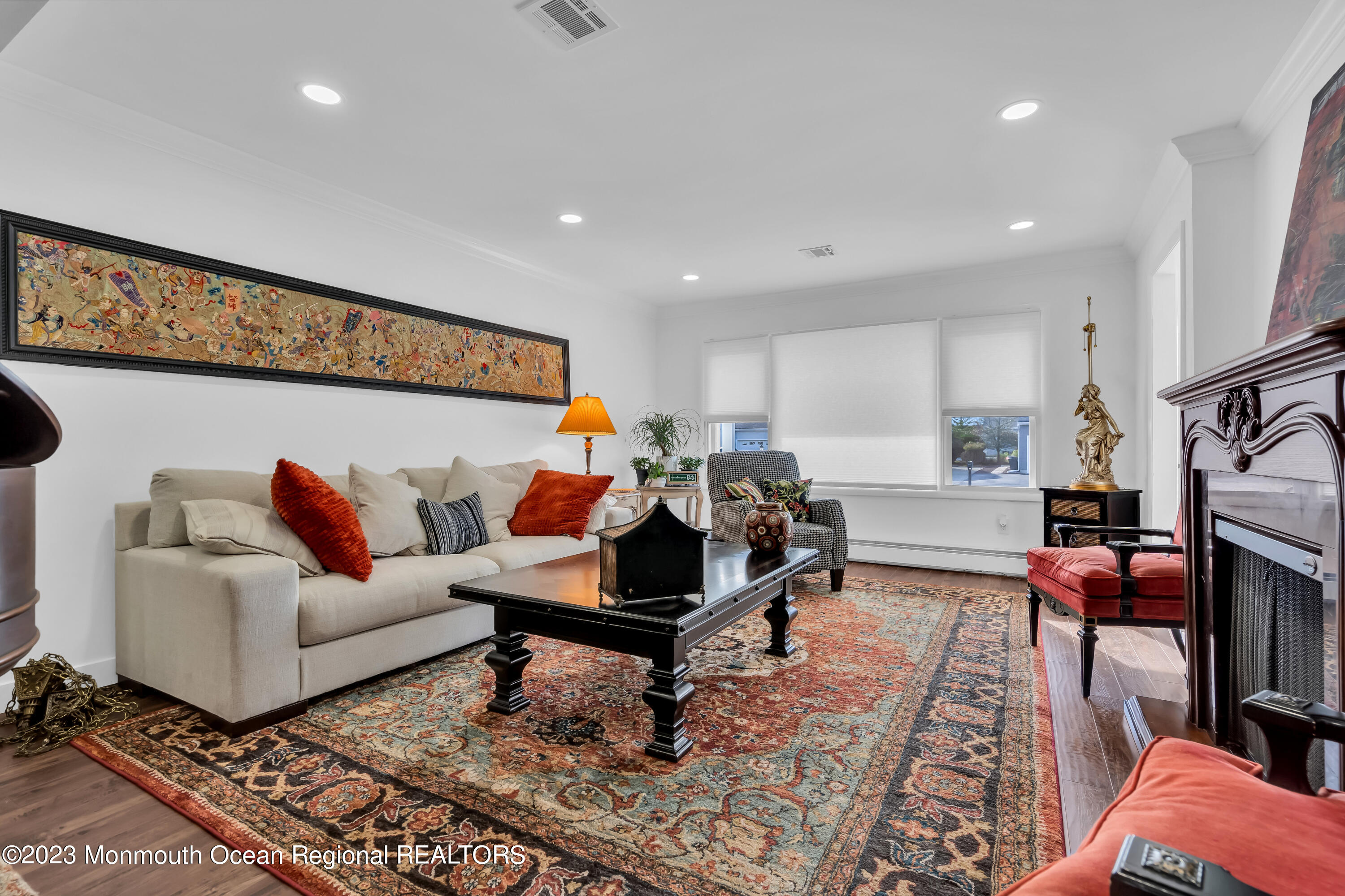 11 Garrett Road Toms River, NJ 08757 - Photo 18 of 61 a living room with furniture and a rug
