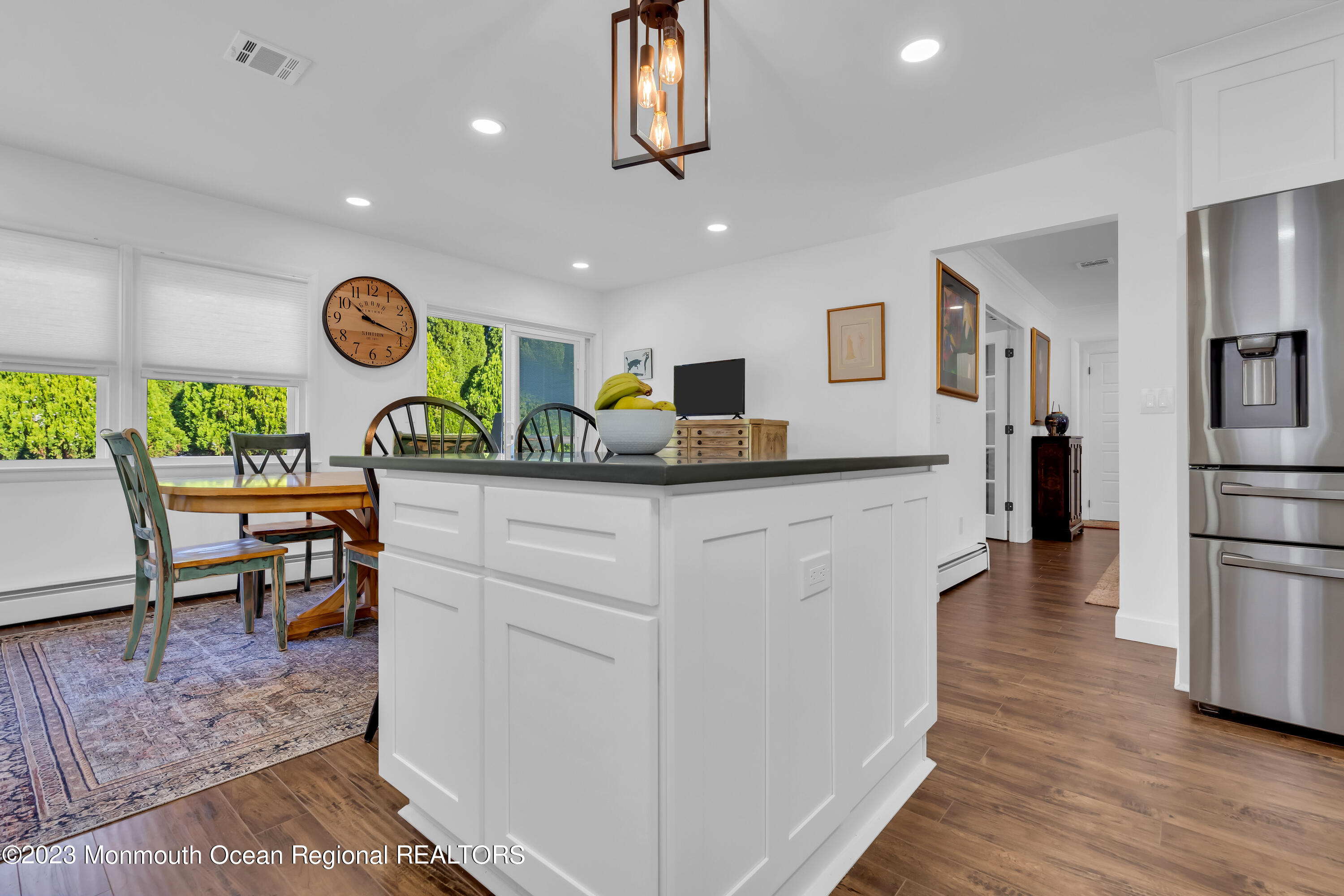11 Garrett Road Toms River, NJ 08757 - Photo 38 of 61 a kitchen with stainless steel appliances kitchen island granite countertop a stove and a refrigerator
