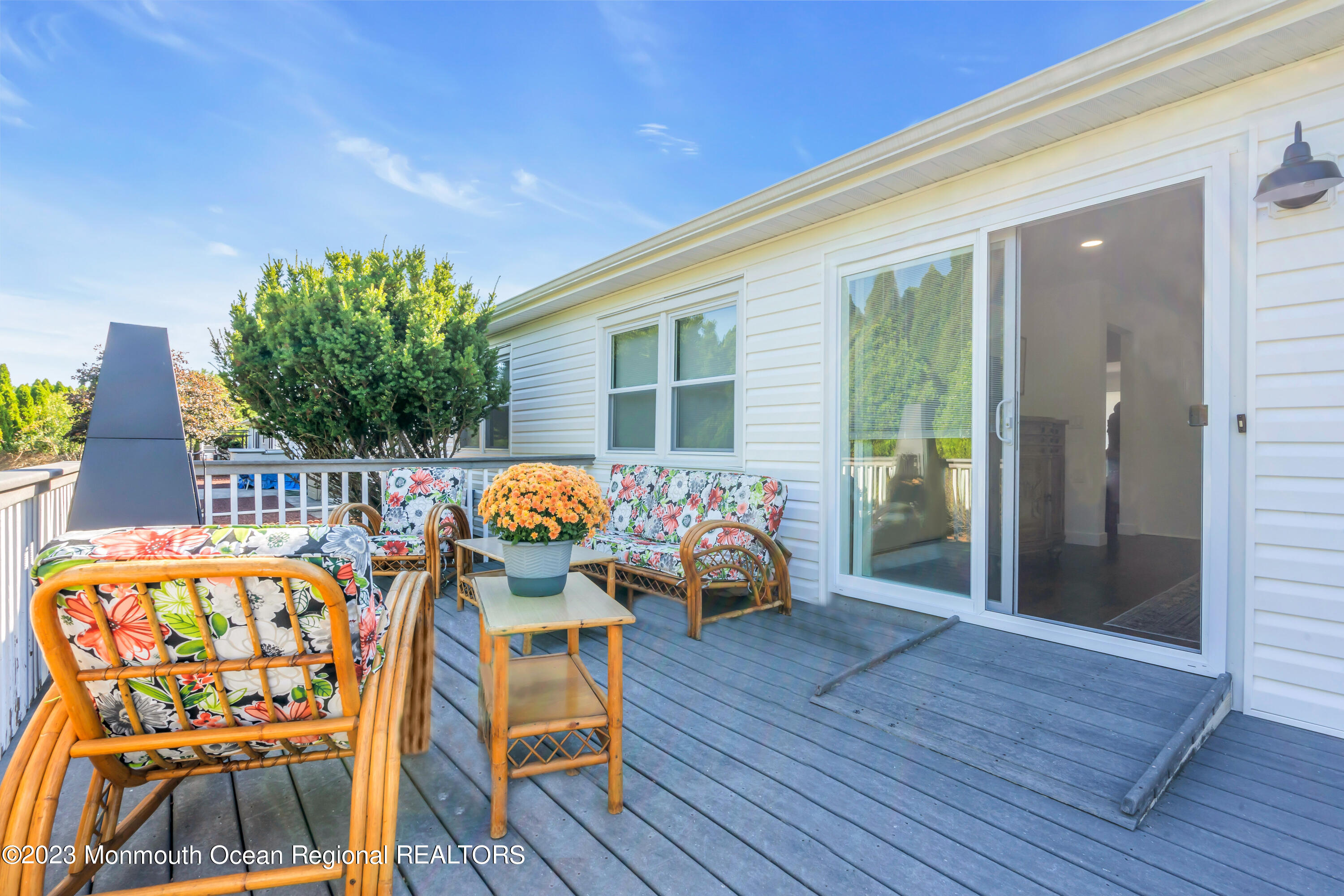 11 Garrett Road Toms River, NJ 08757 - Photo 55 of 61 a balcony with furniture and wooden floor