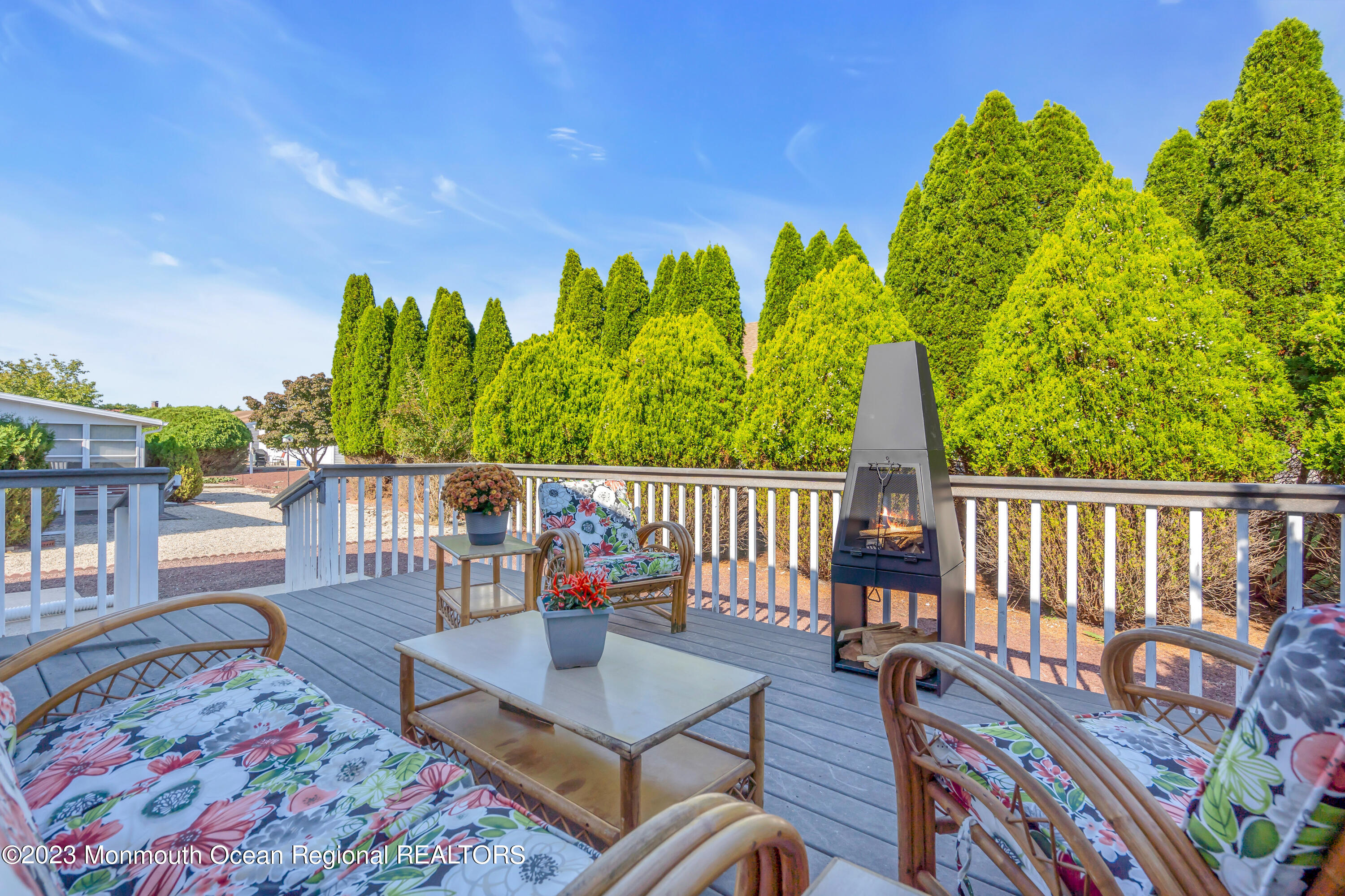 11 Garrett Road Toms River, NJ 08757 - Photo 56 of 61 a balcony with wooden floor and outdoor seating