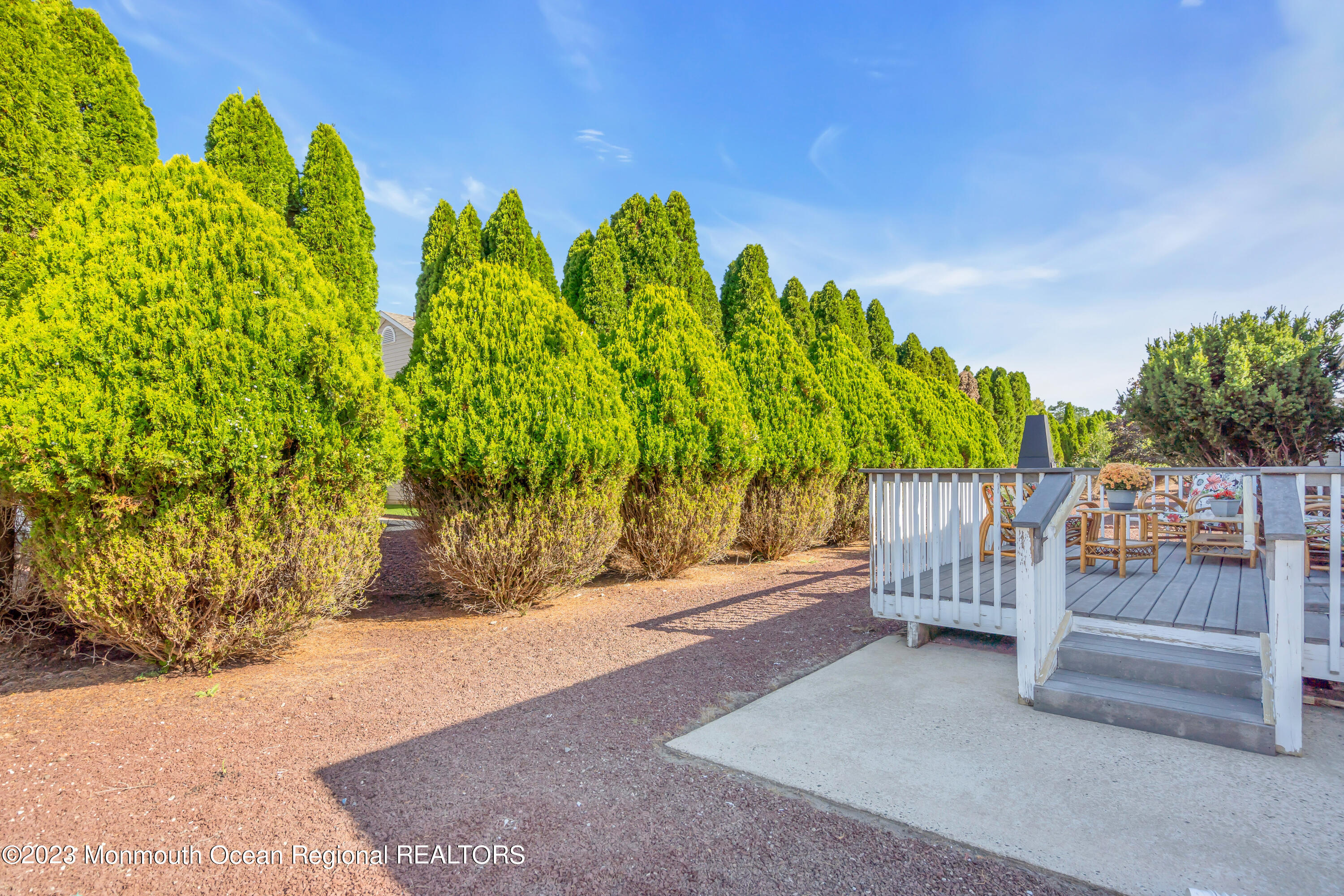 11 Garrett Road Toms River, NJ 08757 - Photo 58 of 61 a view of a garden with wooden fence