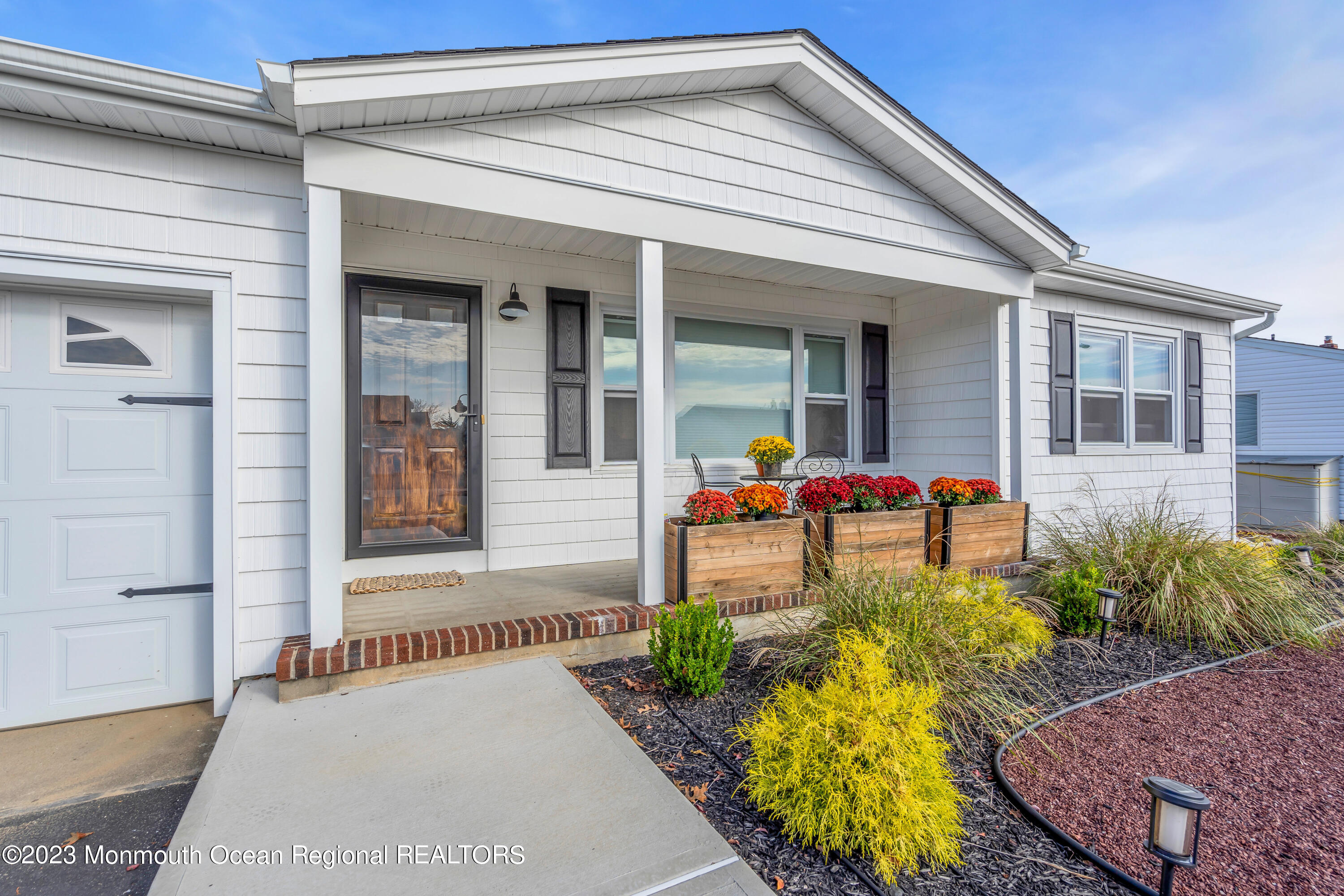 11 Garrett Road Toms River, NJ 08757 - Photo 9 of 61 a front view of a house with porch