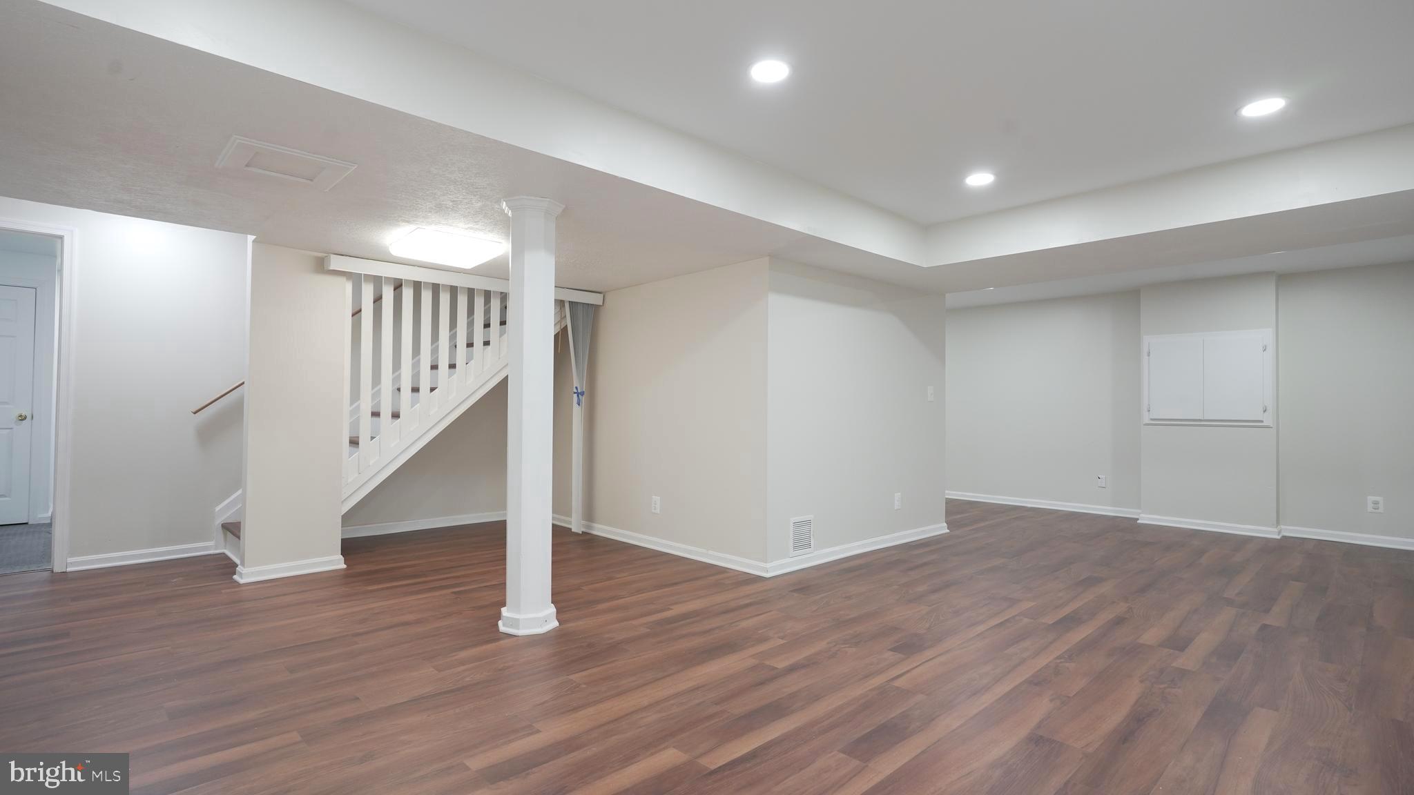 10203 Raleigh Tavern Lane Ellicott City, MD 21042 - Photo 43 of 57 a view of entryway with wooden floor