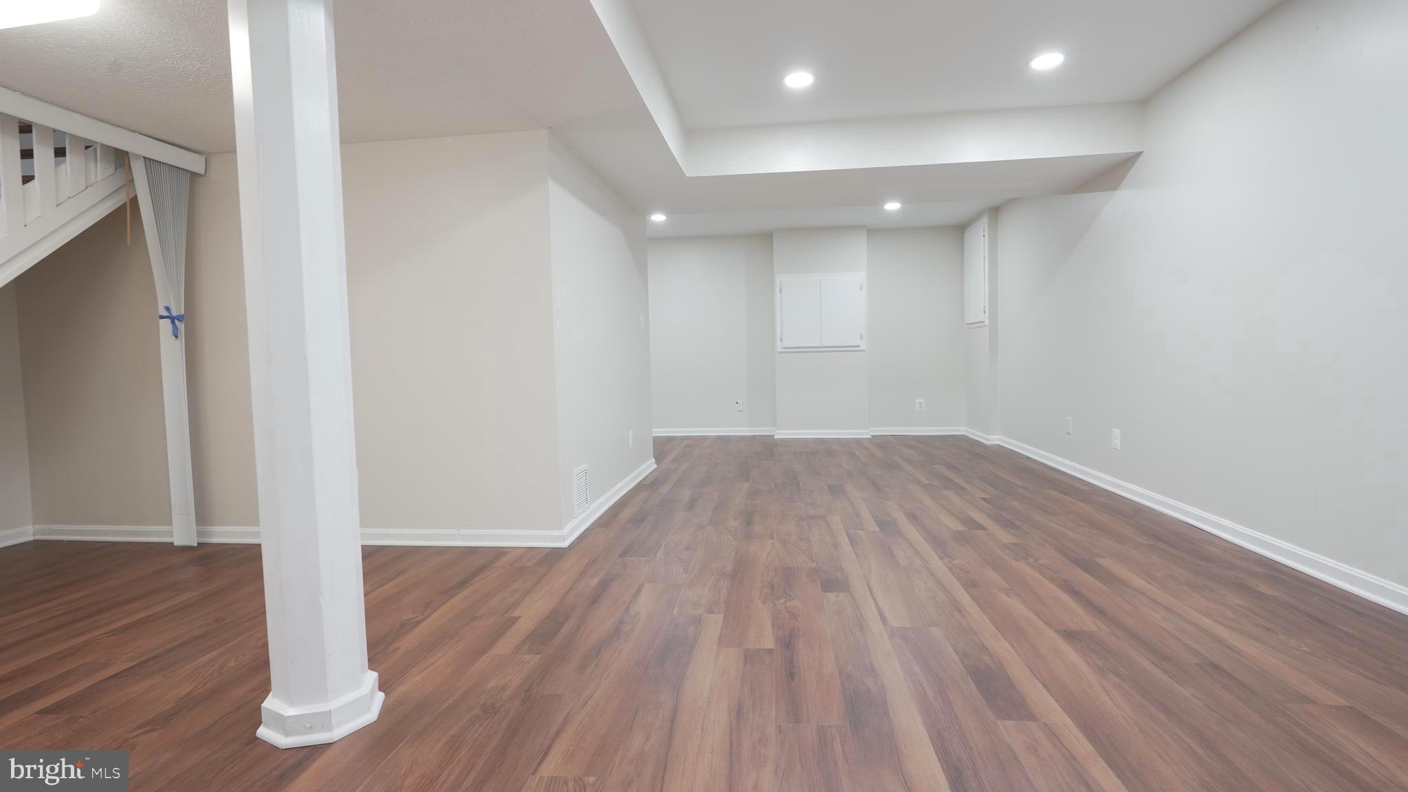 10203 Raleigh Tavern Lane Ellicott City, MD 21042 - Photo 44 of 57 a view of a room with wooden floor and entrance