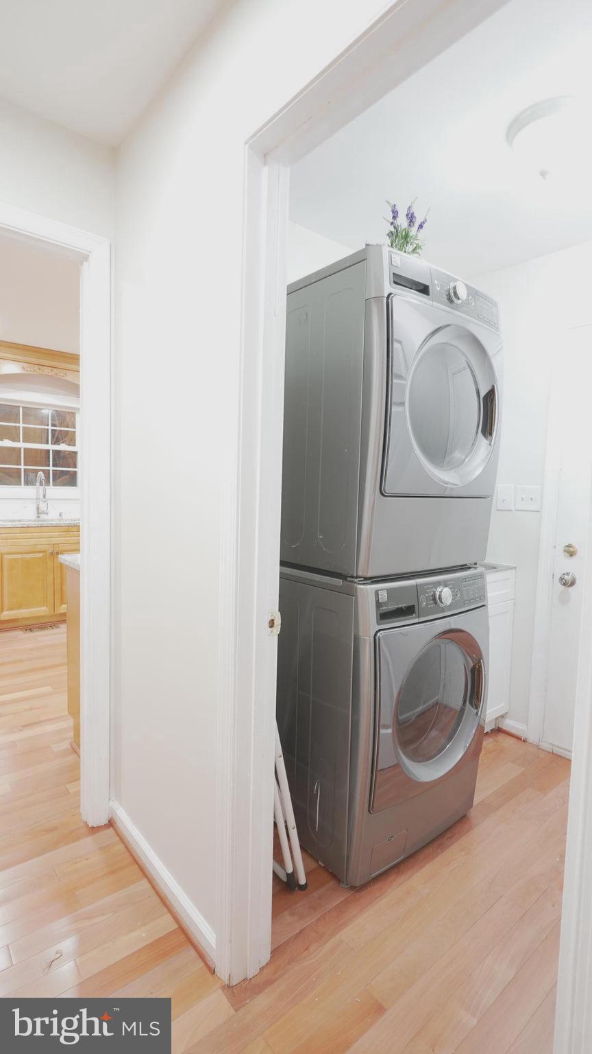 10203 Raleigh Tavern Lane Ellicott City, MD 21042 - Photo 47 of 57 a utility room with dryer and washer