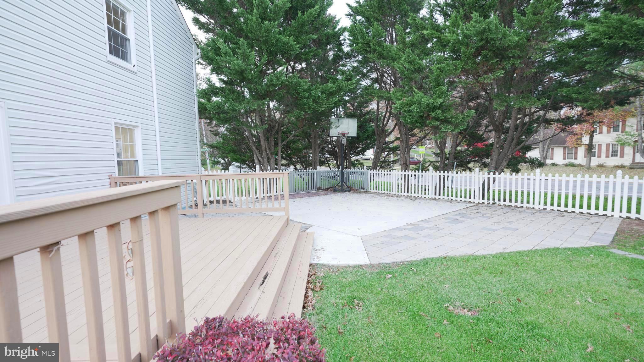 10203 Raleigh Tavern Lane Ellicott City, MD 21042 - Photo 56 of 57 a view of a backyard with a small cabin