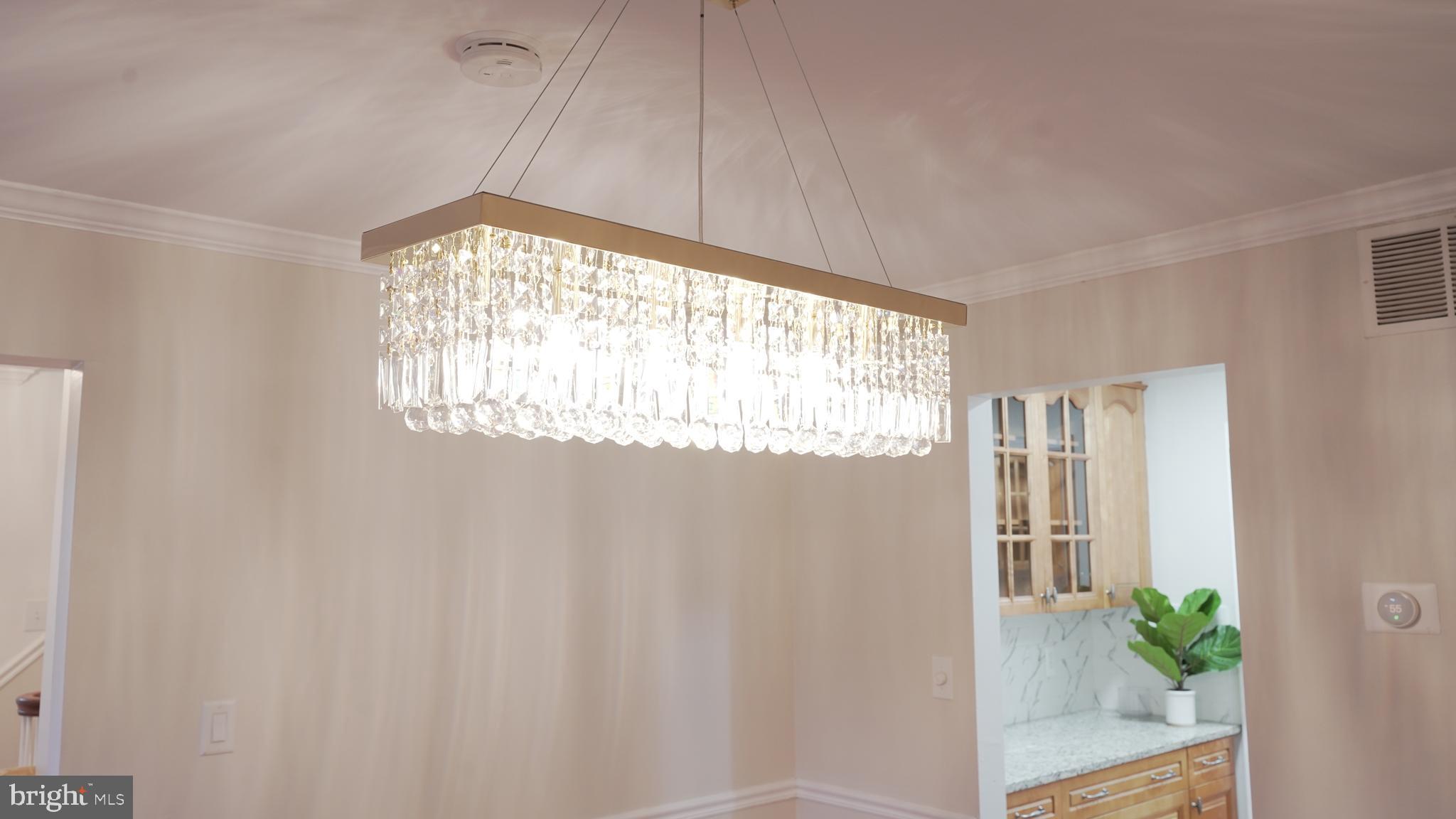 10203 Raleigh Tavern Lane Ellicott City, MD 21042 - Photo 6 of 57 a view of an empty room with a window