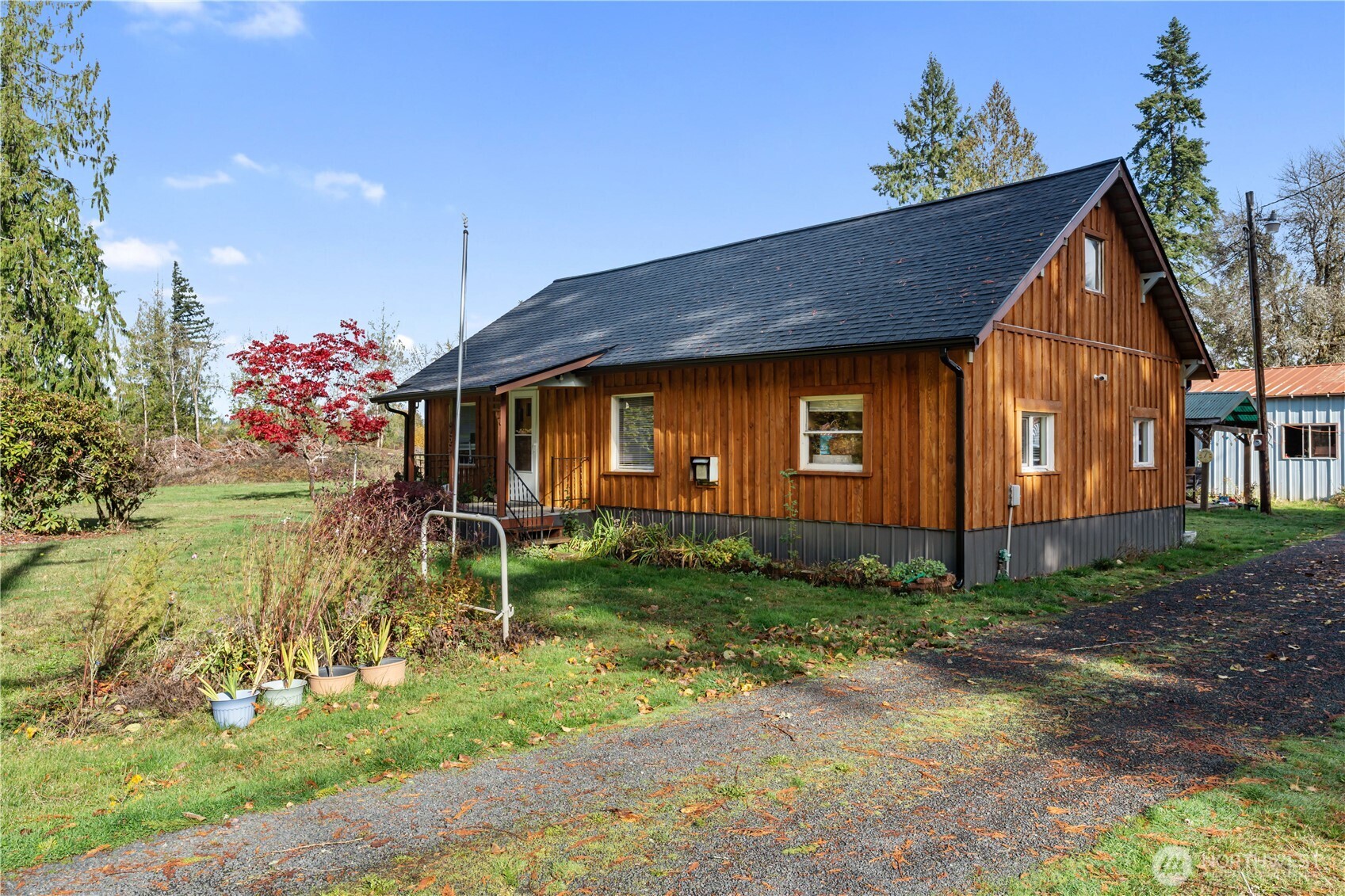 565 Meier Road Winlock, WA 98596 - Photo 6 of 26 a view of a house with backyard and garden