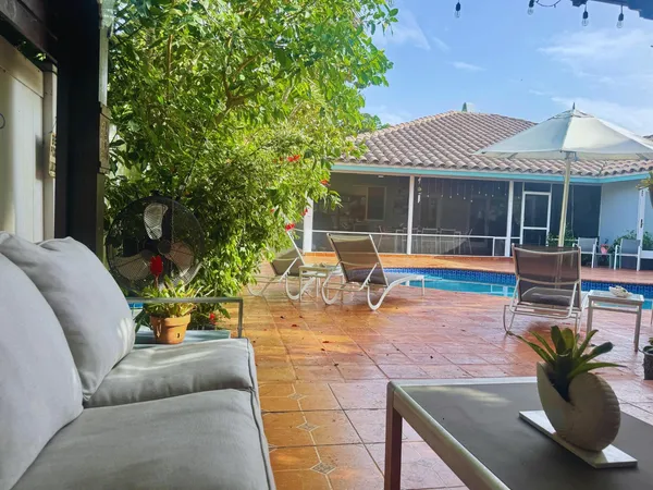 a view of a patio with swimming pool
