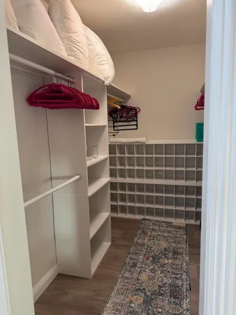 a view of an empty walk in closet