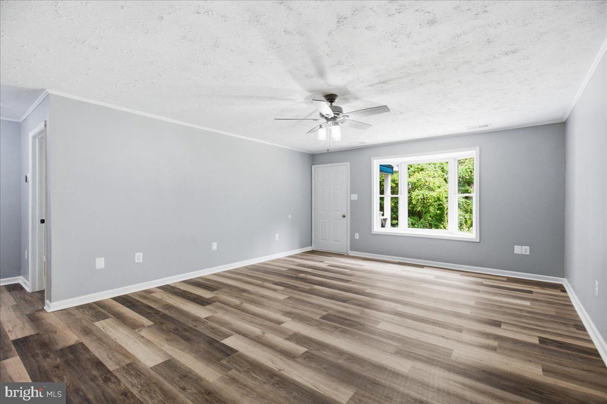 2175 Ponds Wood Road Huntingtown, MD 20639 - Photo 52 of 76 Bright and airy open living space awaits.