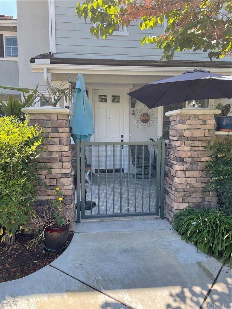 9442 Jack Rabbit Drive, Unit 104 Rancho Cucamonga, CA 91730 - Photo 1 of 1 a view of front door of house