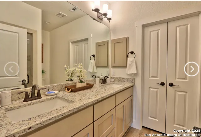 a bathroom with a toilet and shower