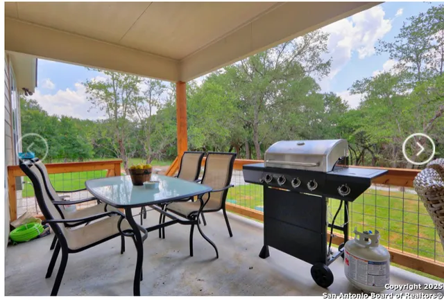 a outdoor living space with furniture and garden view