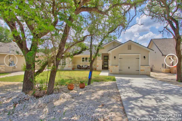 a house view with a backyard space