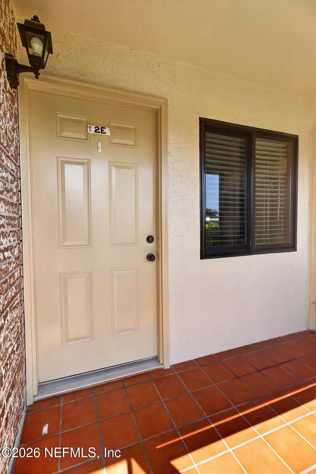 7360 Ulmerton Road, Unit 2E Largo, FL 33771 - Photo 9 of 67 7360 Front Door