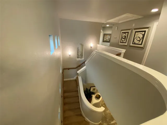 a hallway with windows