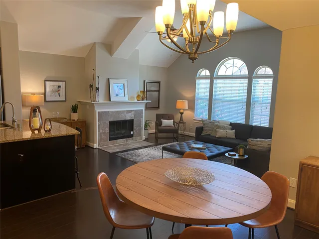 a view of a livingroom with furniture and a fireplace