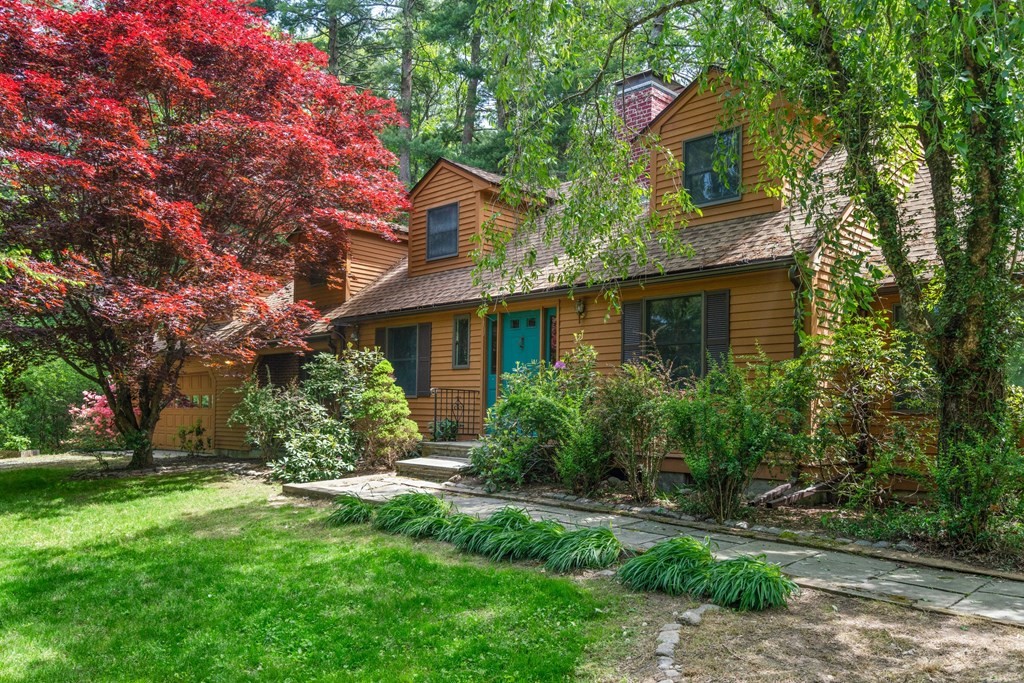 24 Granison Road Weston, MA 02493 - Photo 1 of 30 a front view of a house with a garden