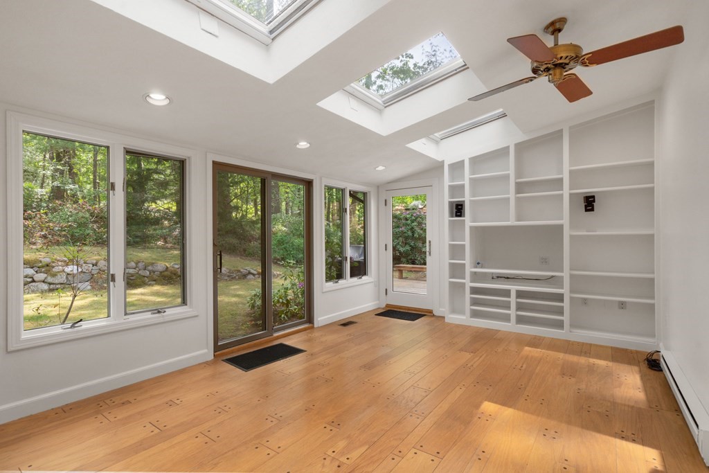24 Granison Road Weston, MA 02493 - Photo 8 of 30 a view of an empty room with a window