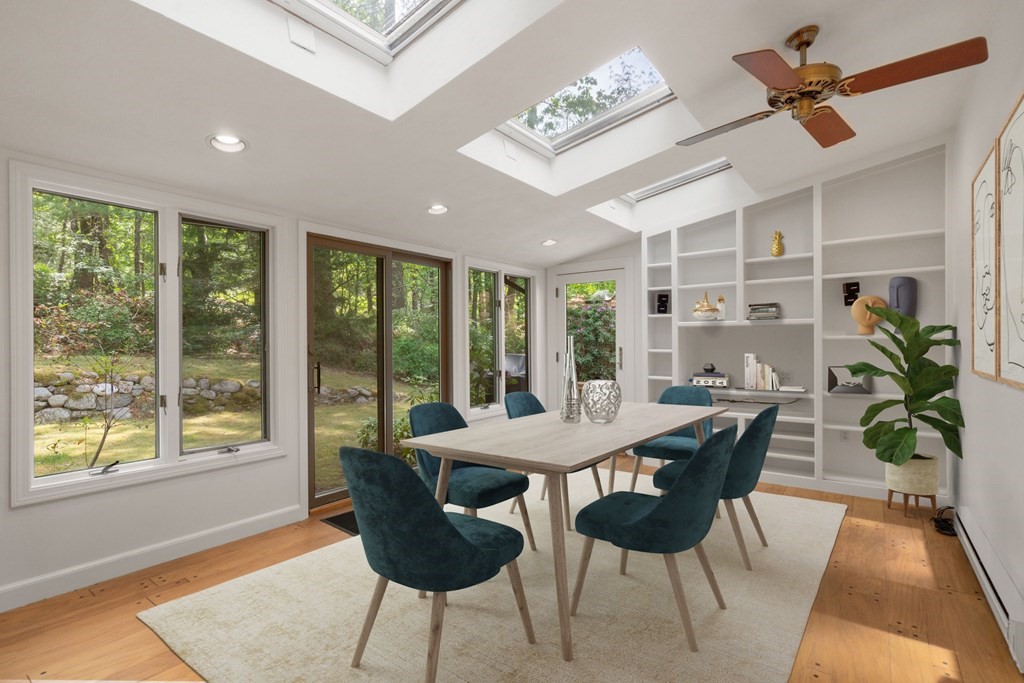 24 Granison Road Weston, MA 02493 - Photo 9 of 30 a view of a dining room with furniture window and wooden floor