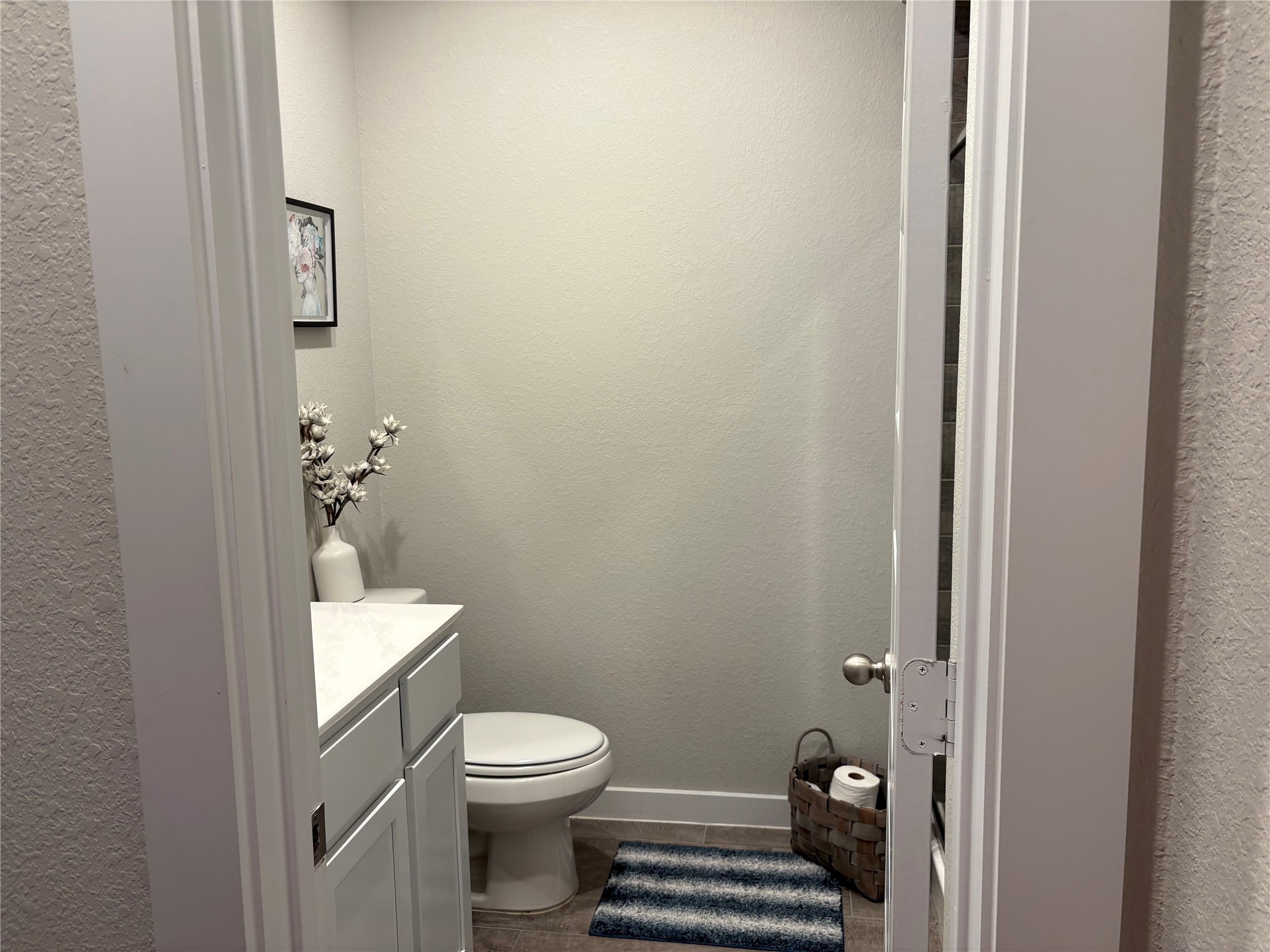 2142 Reed Cave Lane Spring, TX 77386 - Photo 12 of 15 a white toilet sitting next to a bathroom sink