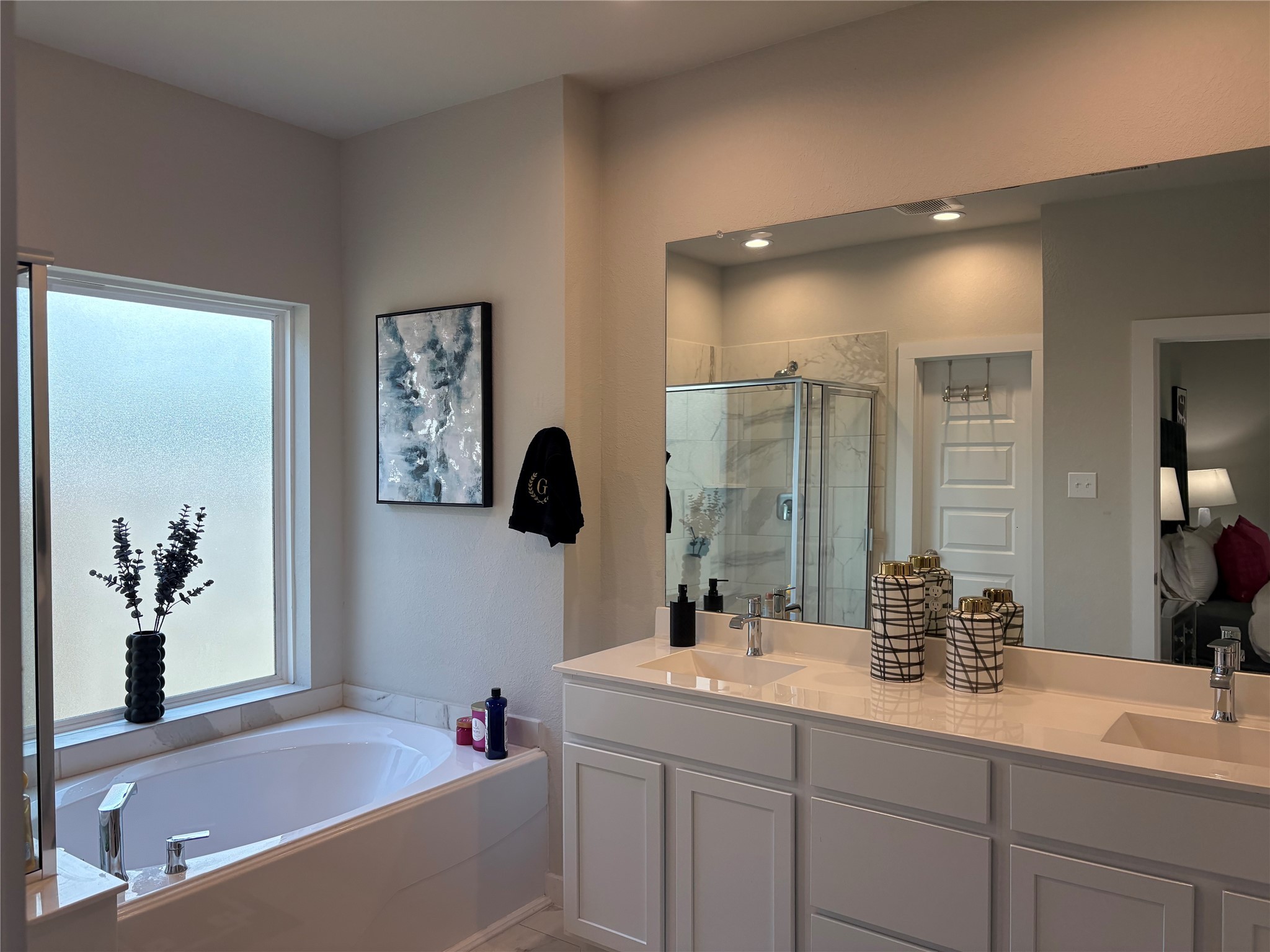 2142 Reed Cave Lane Spring, TX 77386 - Photo 15 of 15 a bathroom with a tub sink and mirror
