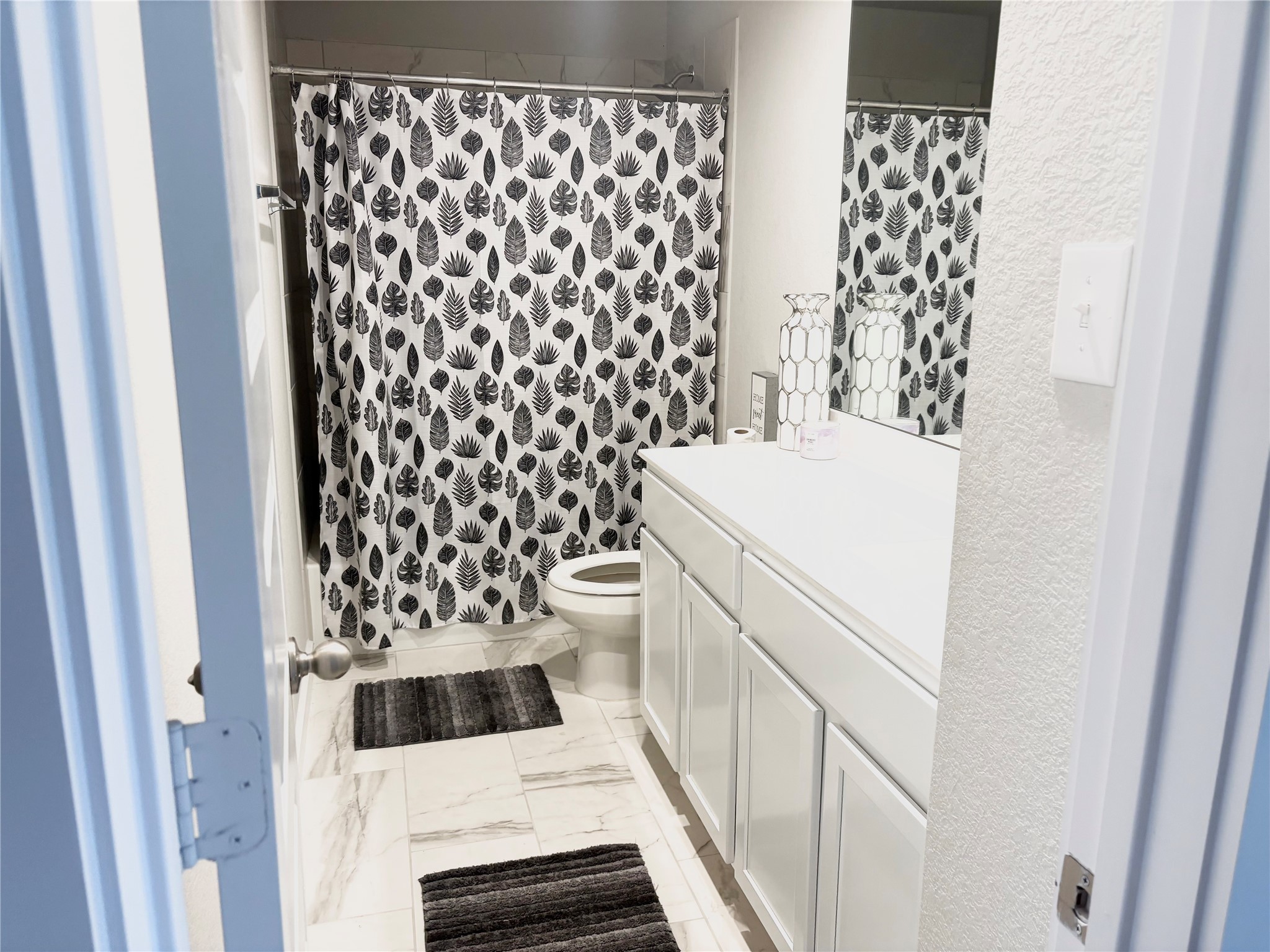 2142 Reed Cave Lane Spring, TX 77386 - Photo 4 of 15 a bathroom with a sink and a toilet