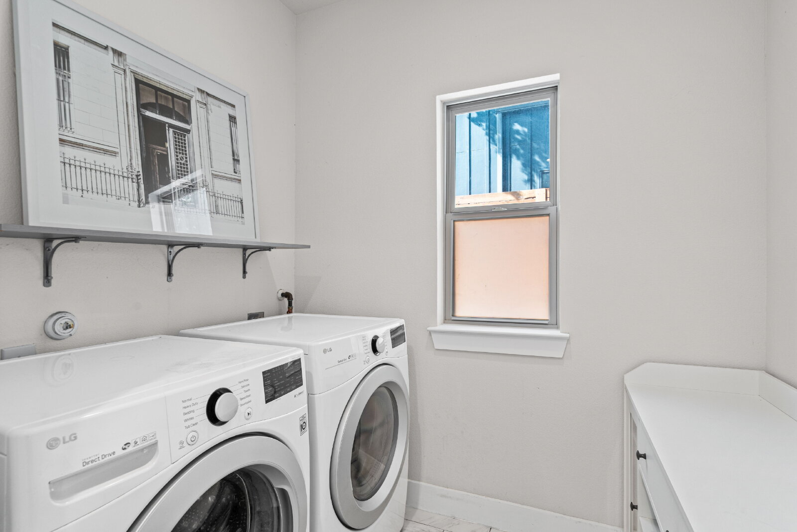 2906 Webberville Road, Unit 1 Austin, TX 78702 - Photo 8 of 23 a utility room with dryer and washer