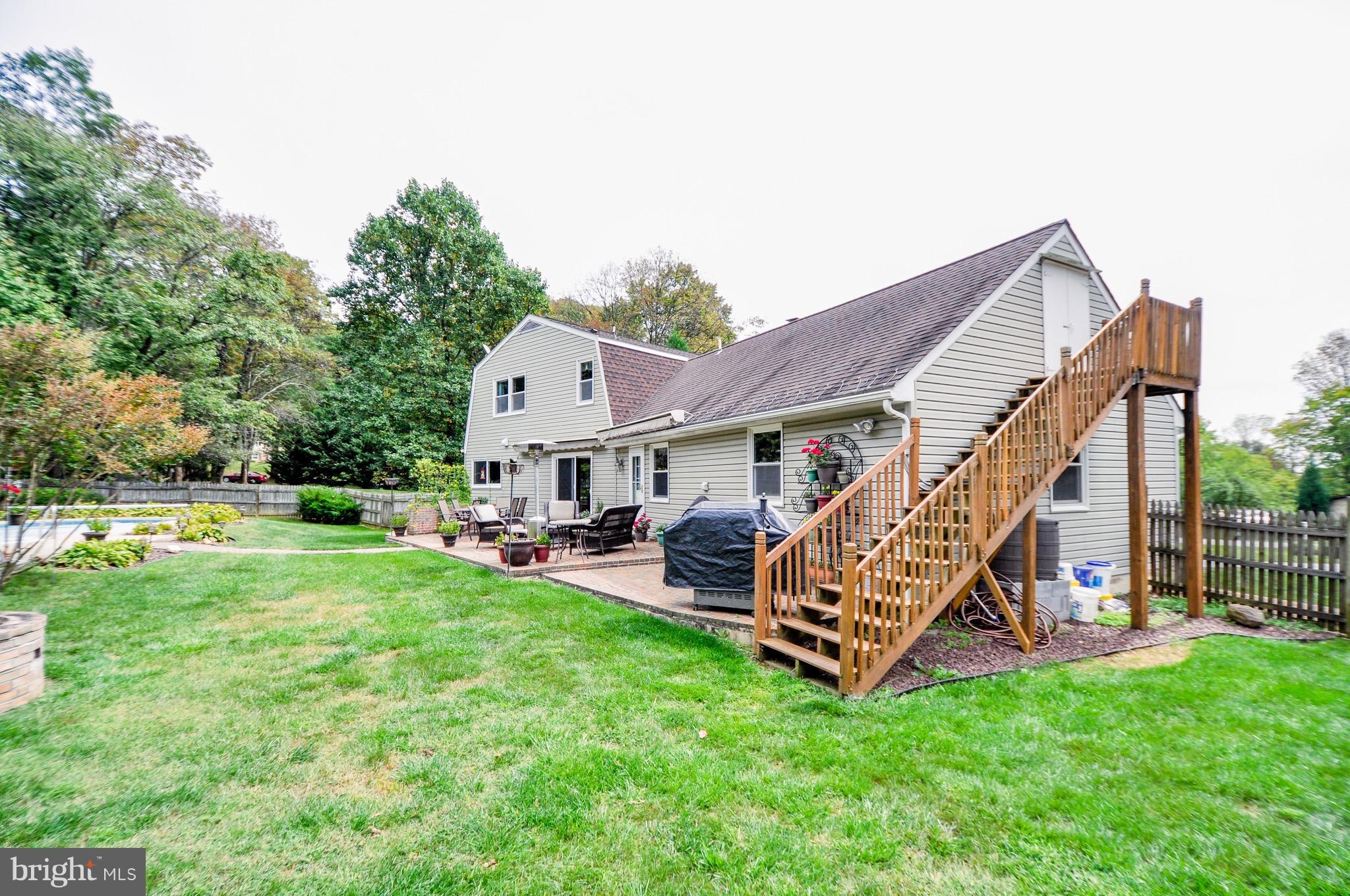 5502 Woodlyn Road Frederick, MD 21703 - Photo 7 of 30 a view of a house with a back yard
