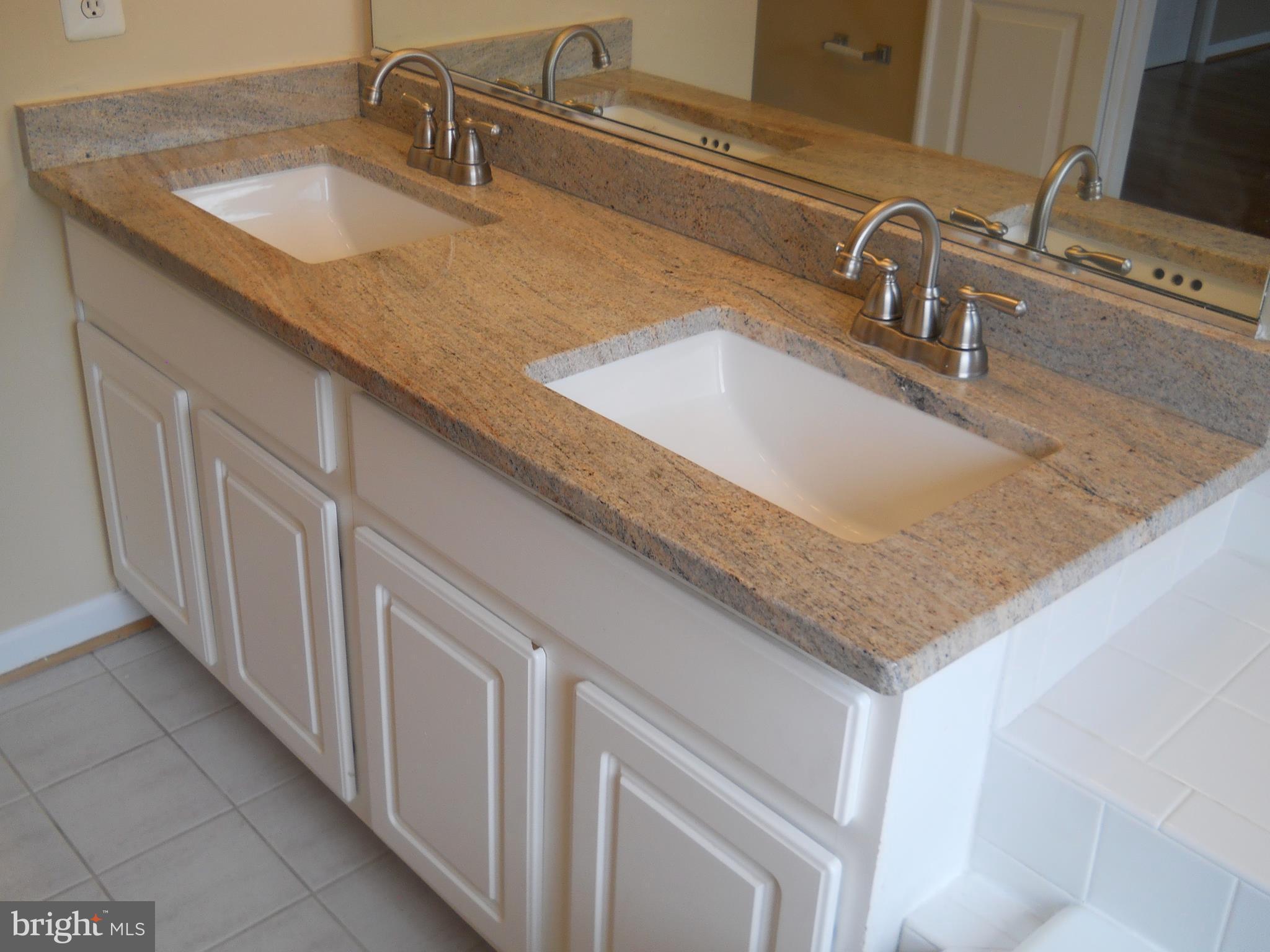 2917 St Helen Circle Silver Spring, MD 20906 - Photo 17 of 30 MASTER BATHROOM WITH CUPBOARD SPACE