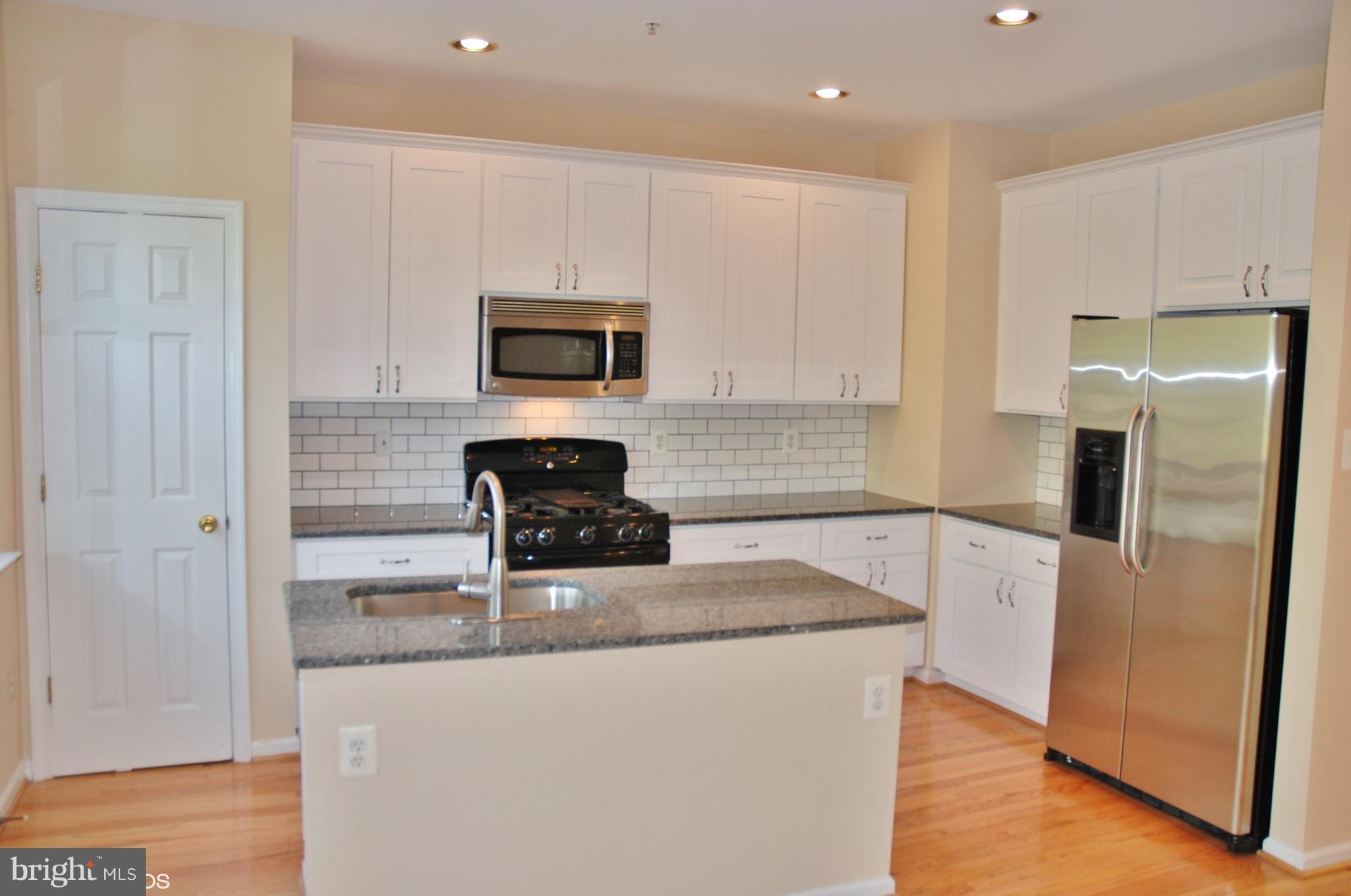 2917 St Helen Circle Silver Spring, MD 20906 - Photo 7 of 30 KITCHEN WITH GRANITE COUNTERTOPS