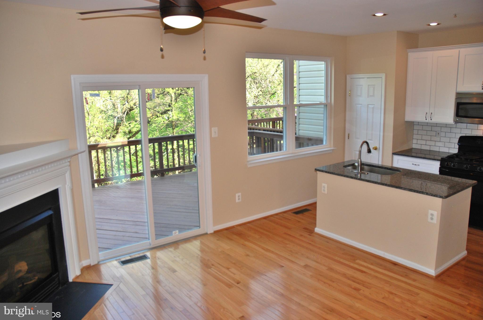 2917 St Helen Circle Silver Spring, MD 20906 - Photo 8 of 30 FAMILY ROOM W/SLIDER TO ENTERTAINING DECK
