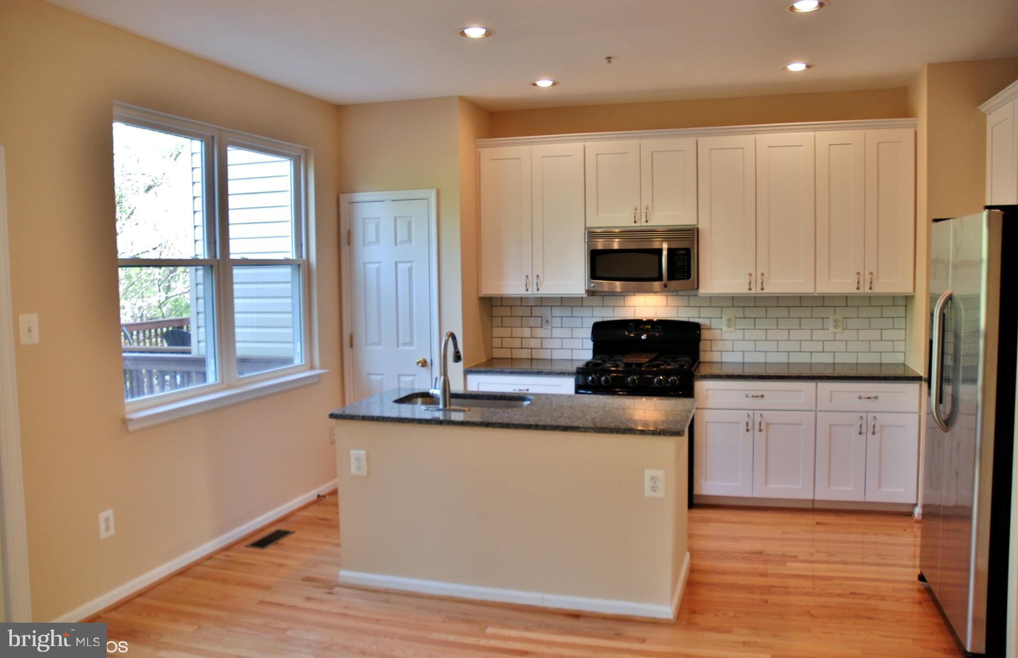 2917 St Helen Circle Silver Spring, MD 20906 - Photo 10 of 30 CENTER AISLE KITCHEN