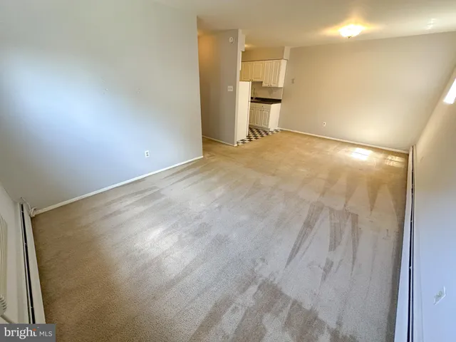 an empty room with a workbench